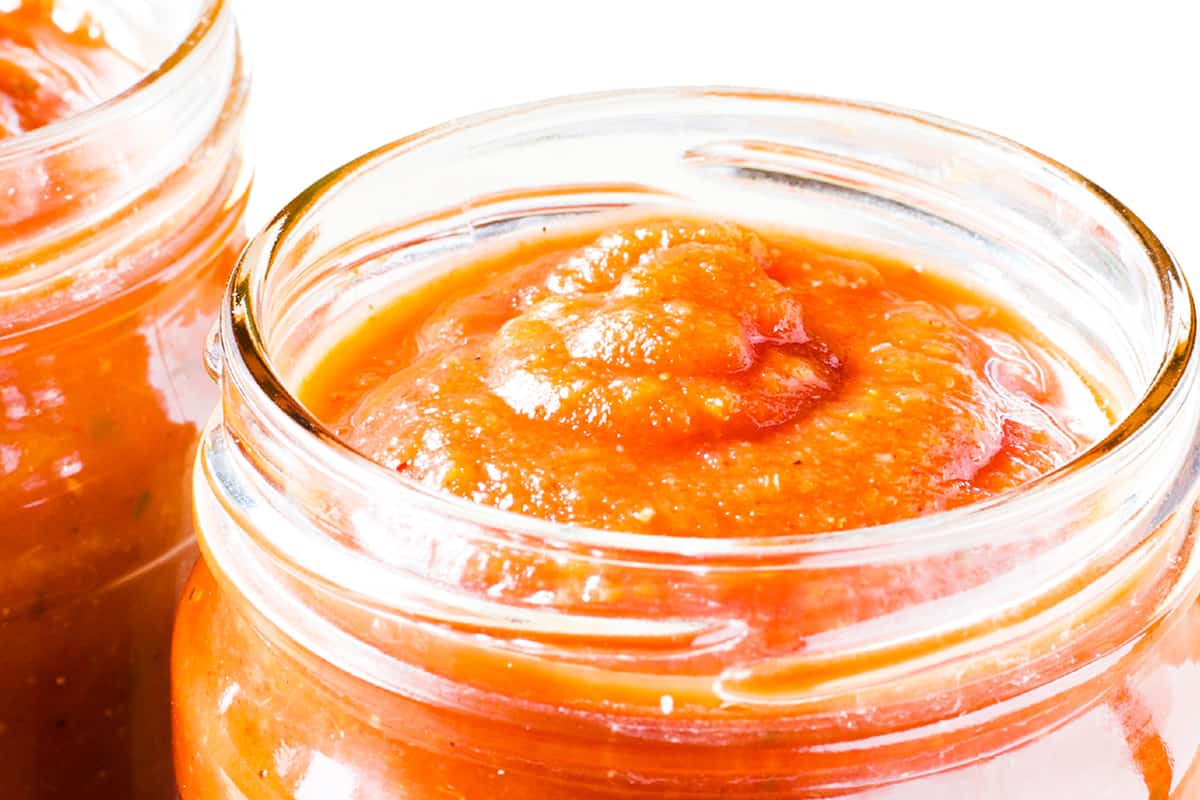 two glass jars filled with Fresh Tomato Sauce