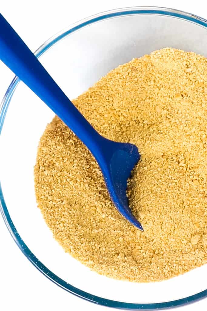 gram cracker crumbs in mixed in a bowl with brown sugar