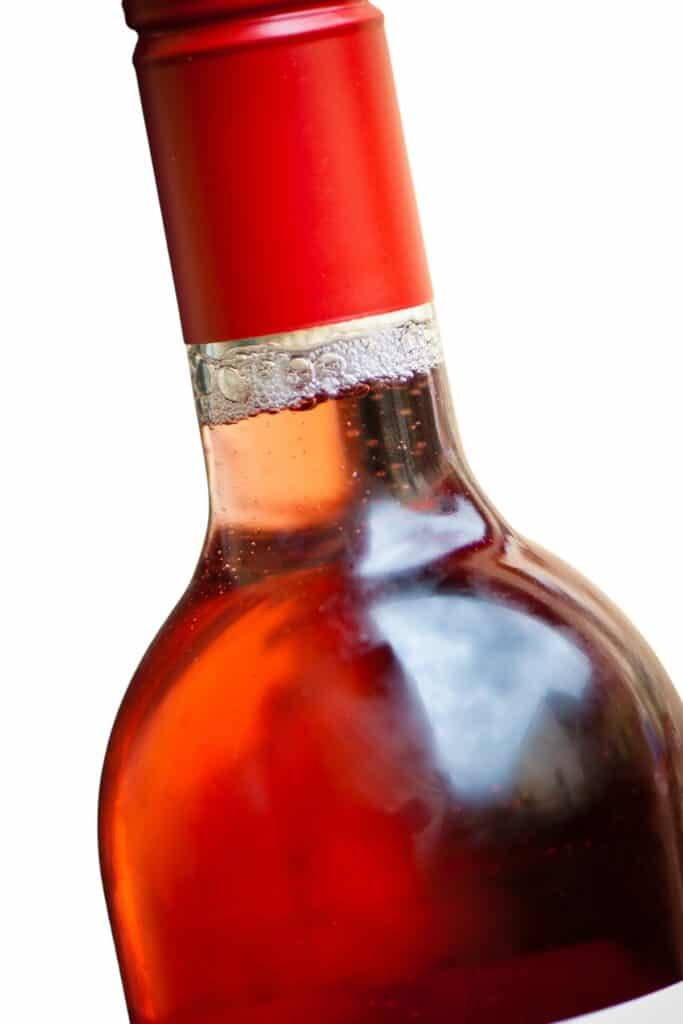 a close up image of a bottle of Rosé wine