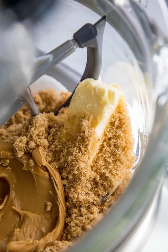 butter, brown sugar, and peanut butter in the bowl of a stand mixer.