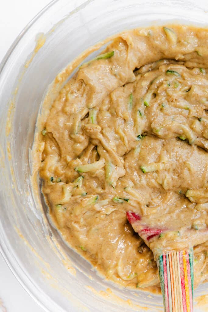 Zucchini Bread batter in a glass bowl.