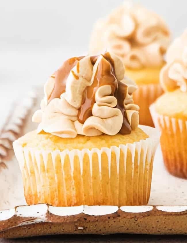 A tray of cupcakes on a table