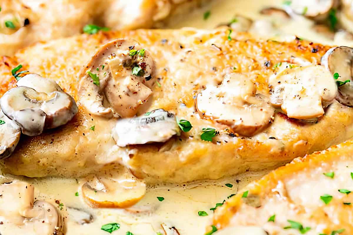 creamy mushroom chicken in a skillet ready to be served.