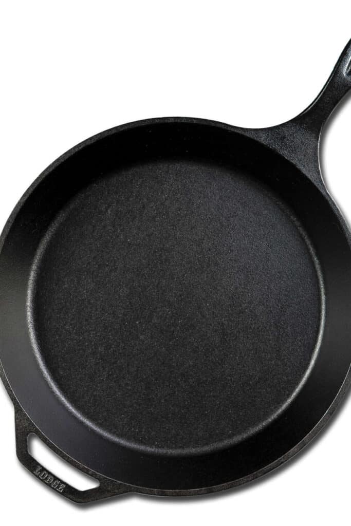 A lodge cast iron skillet with a white background