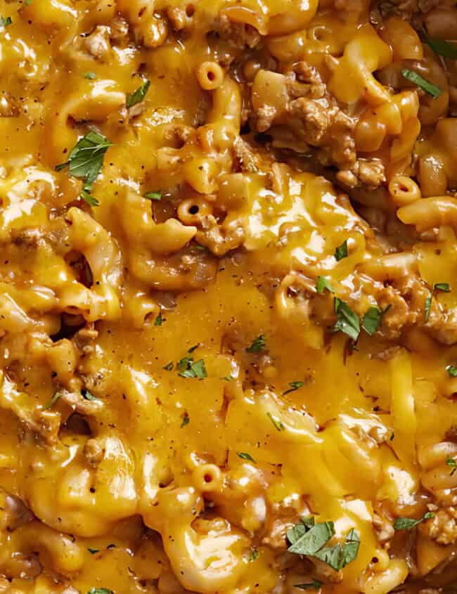 A close up image of Chili mac and cheese in a pot