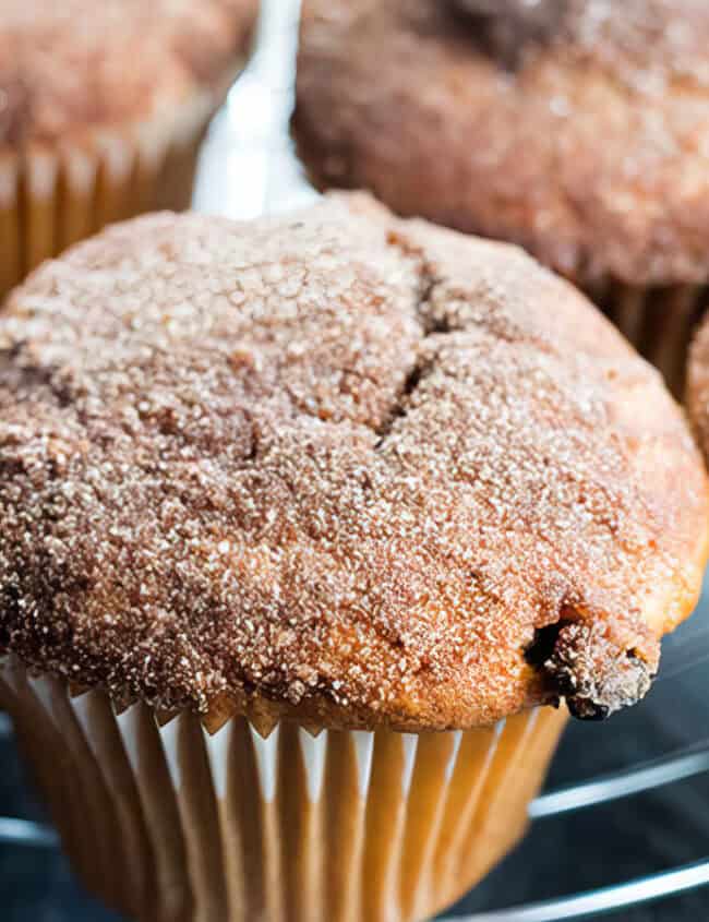 Cinnamon Sugar Jumbo Muffins Topped with Cinnamon Sugar on a cooling rack ready to serve.