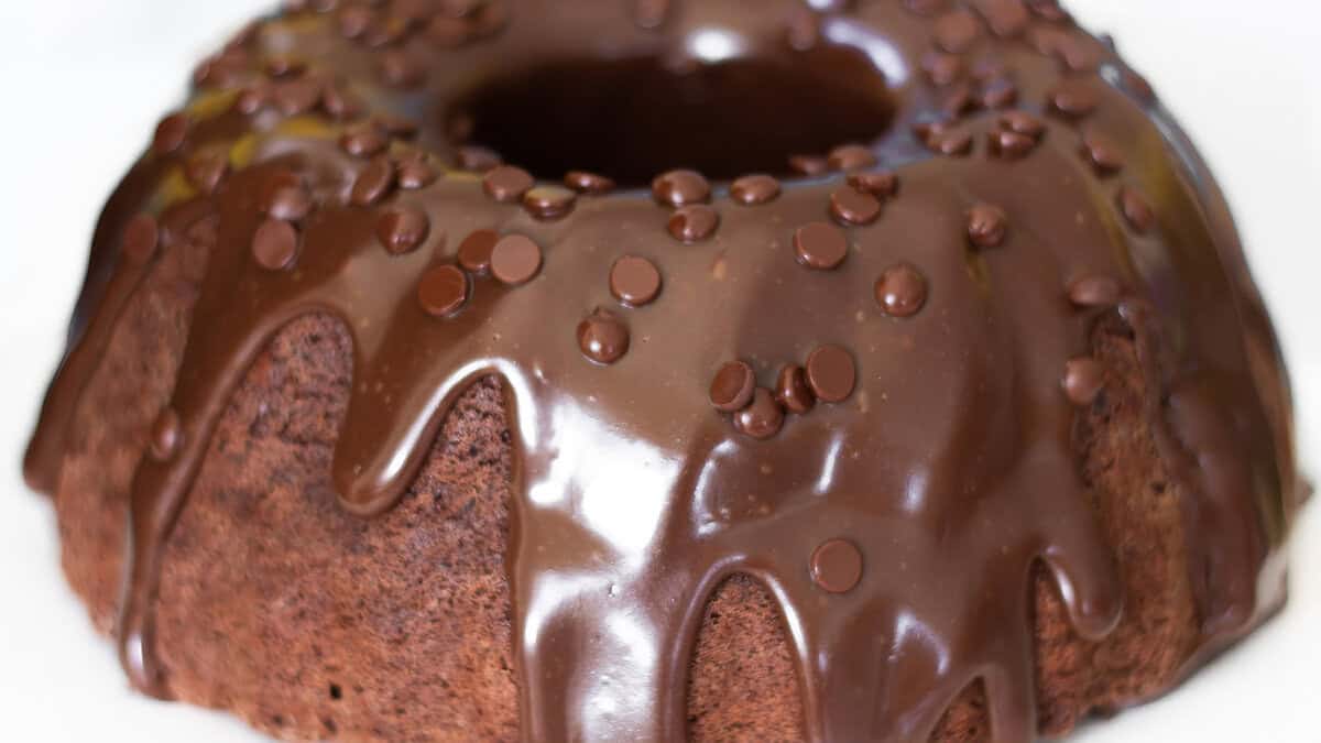 A Chocolate Bundt Cake with a cake topped with chocolate chips.