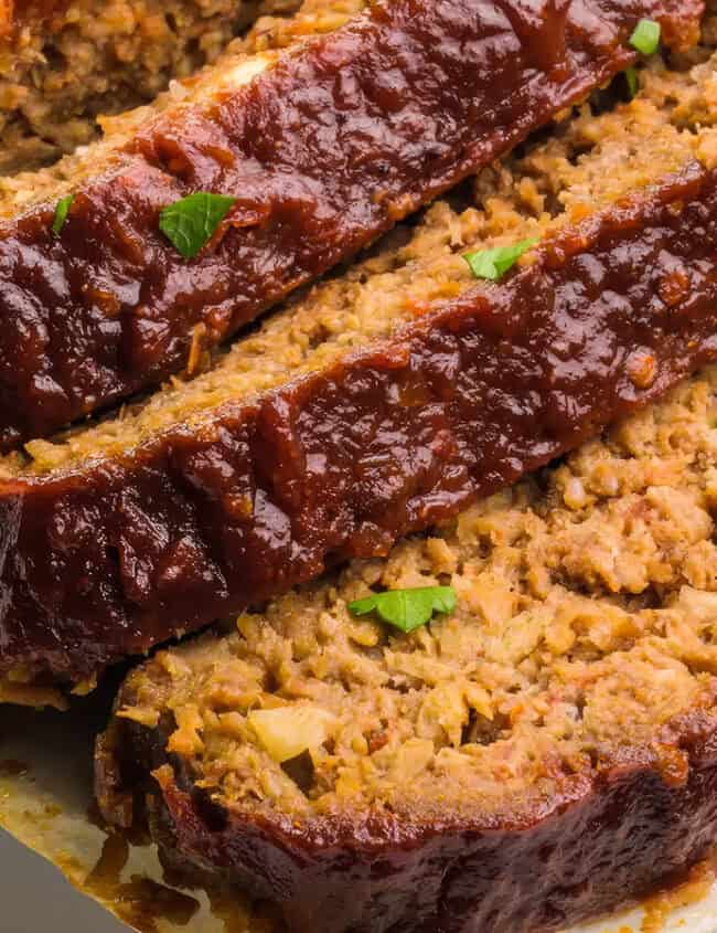 a close up image of a sliced Impossible Meatloaf.