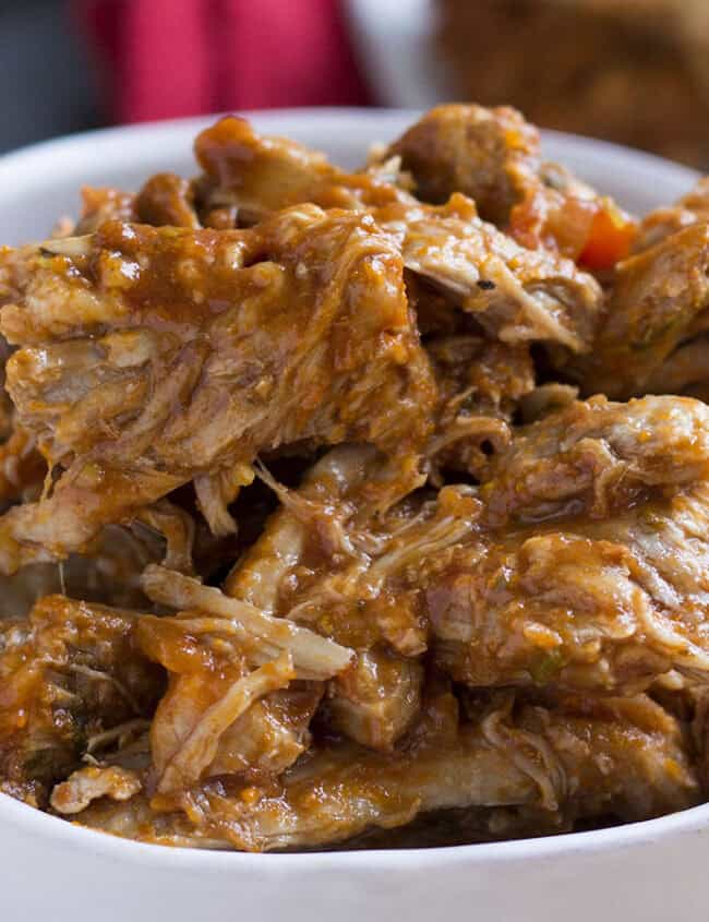 A white bowl full of Italian Pulled Pork.