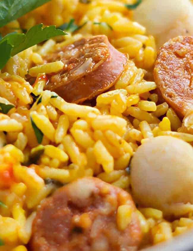 A close up image of a pan of Scallops & Chorizo Paella.