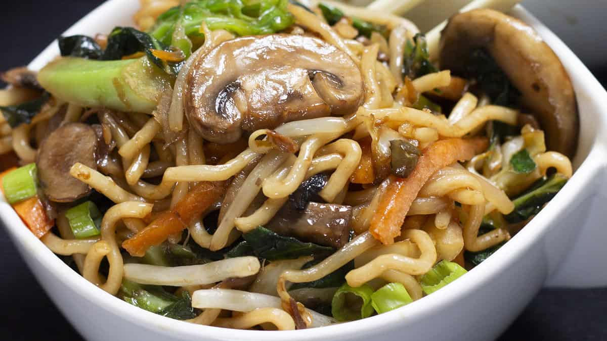 Perfect Chinese Noodles {Lo Mein} in a bowl with chopsticks.