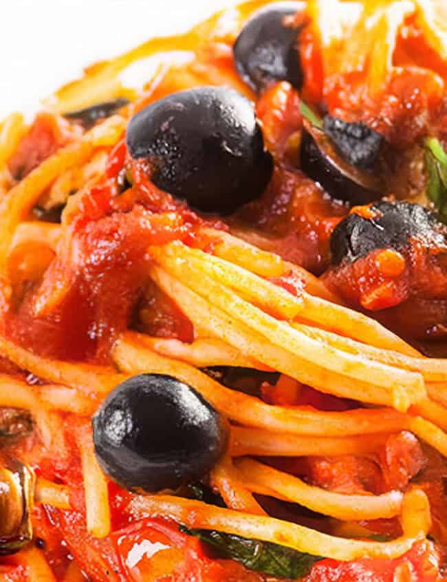 Spaghetti Alla Puttanesca freshly served and ready to eat.