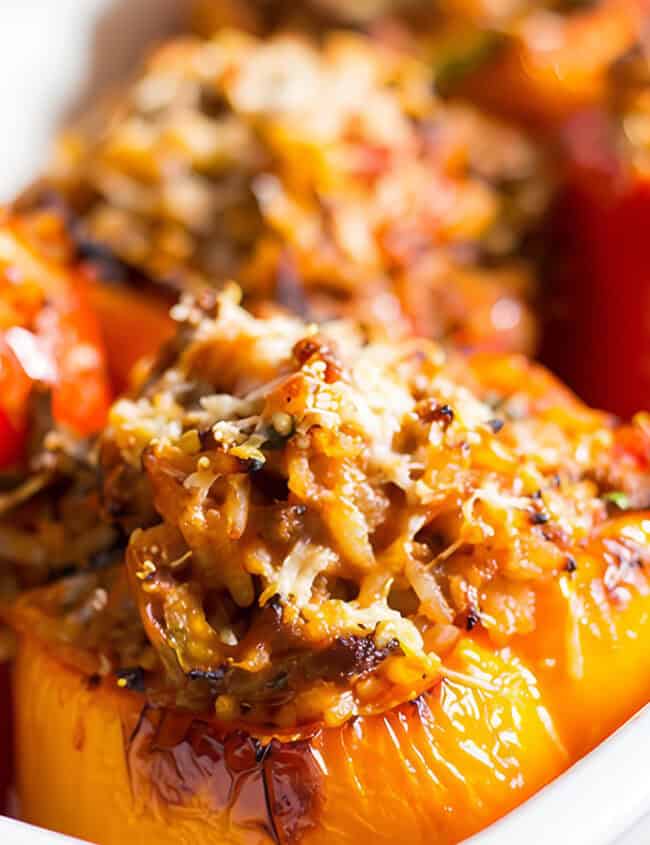 Stuffed peppers right out of the oven with golden tops.