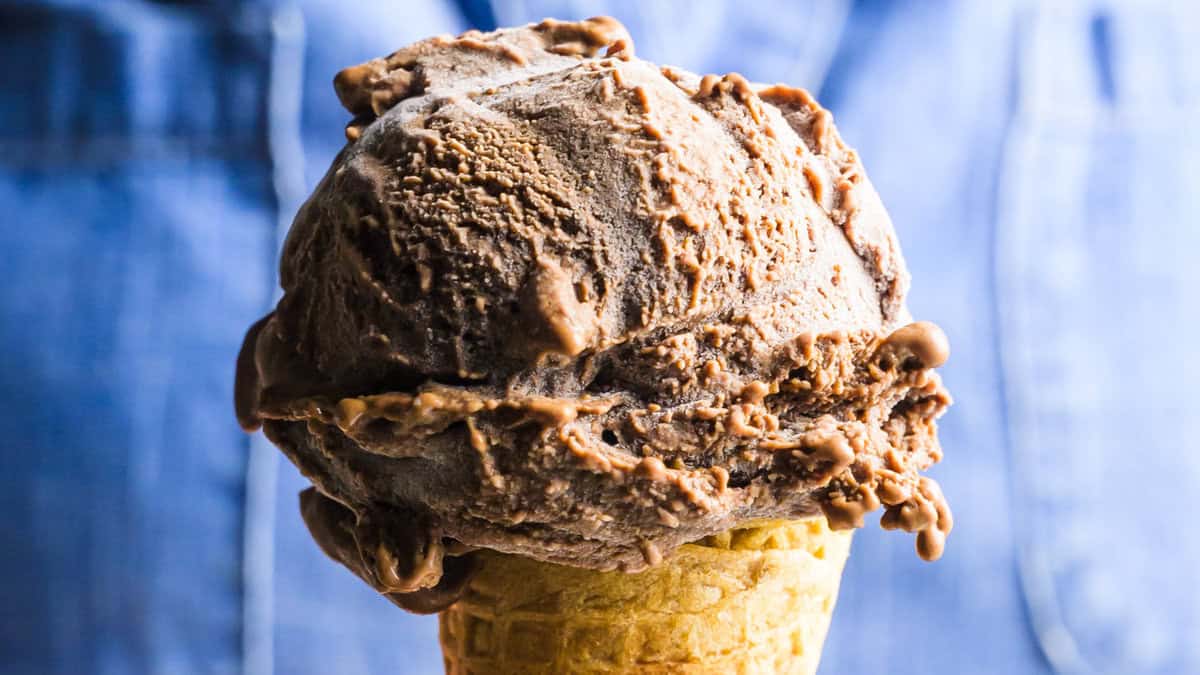 A close up image of a Vegan Chocolate Ice Cream cone.