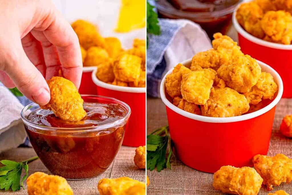 A close-up image of crispy, golden chicken nuggets served in a red cup. On the left, a hand is dipping a nugget into a bowl of dark, rich dipping sauce. Fresh parsley leaves are scattered around, enhancing the presentation.