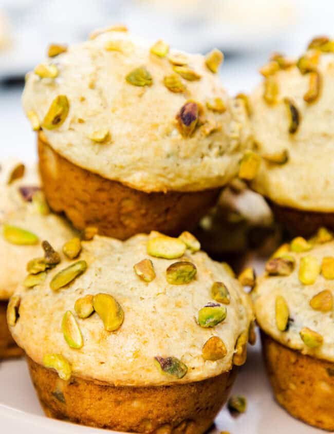 A plate of freshly baked Pistachio Muffins.