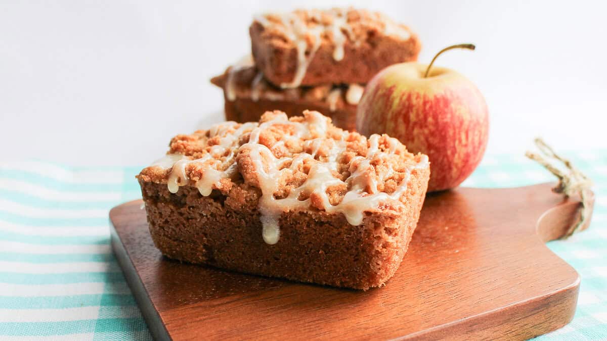 Apple Crumb Cakes drizzled with icing, ready to eat