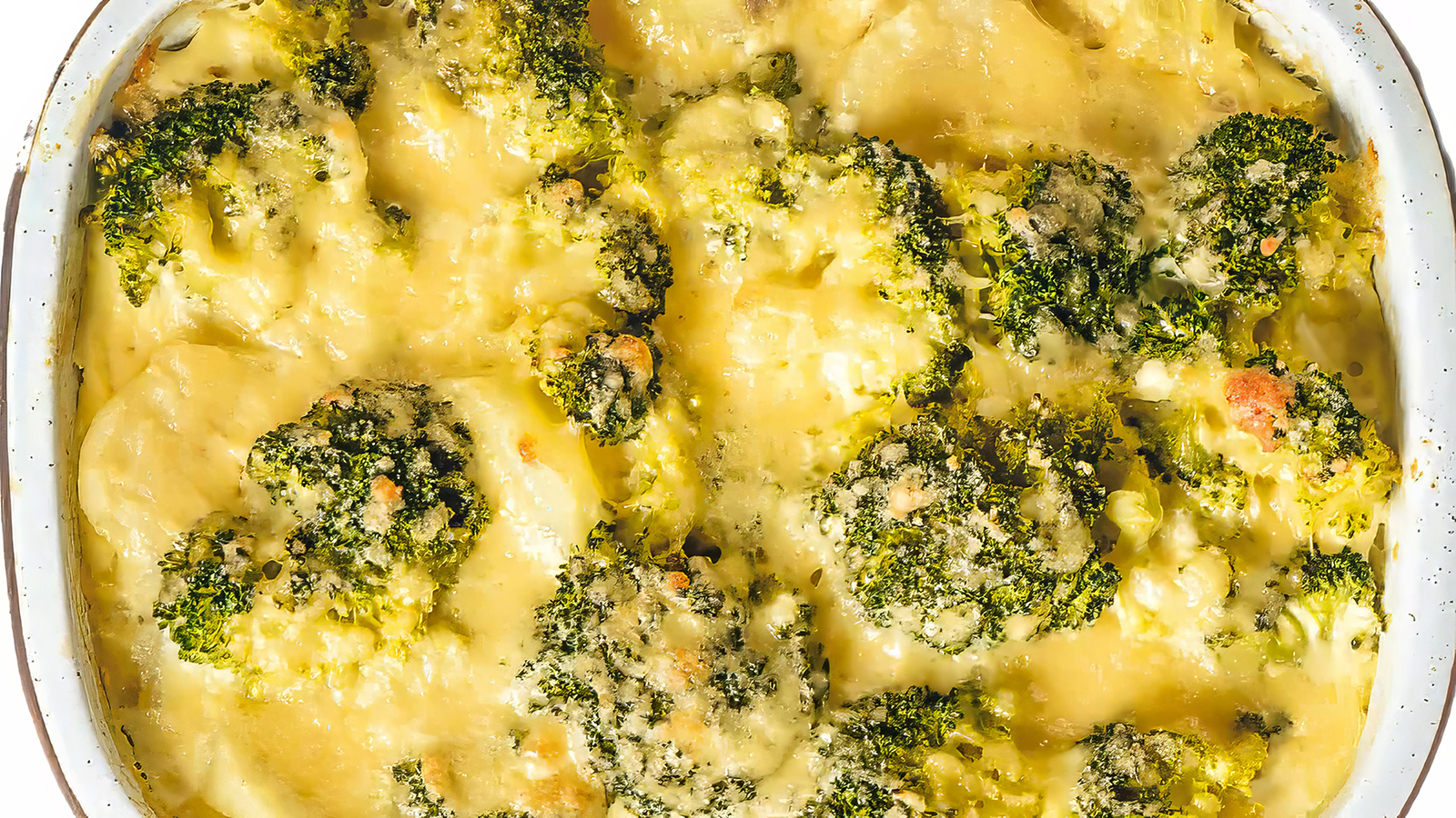 A close up image of a pan full of Broccoli Cauliflower Casserole.