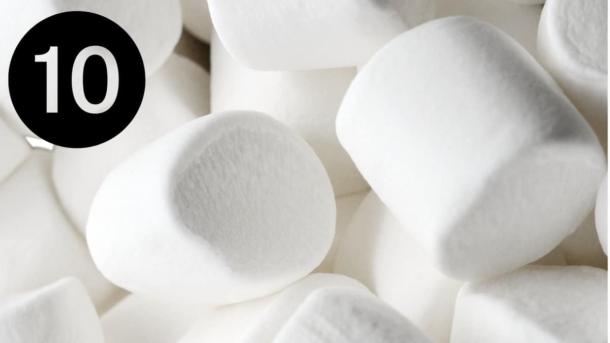 A pile of marshmallows on a white background.