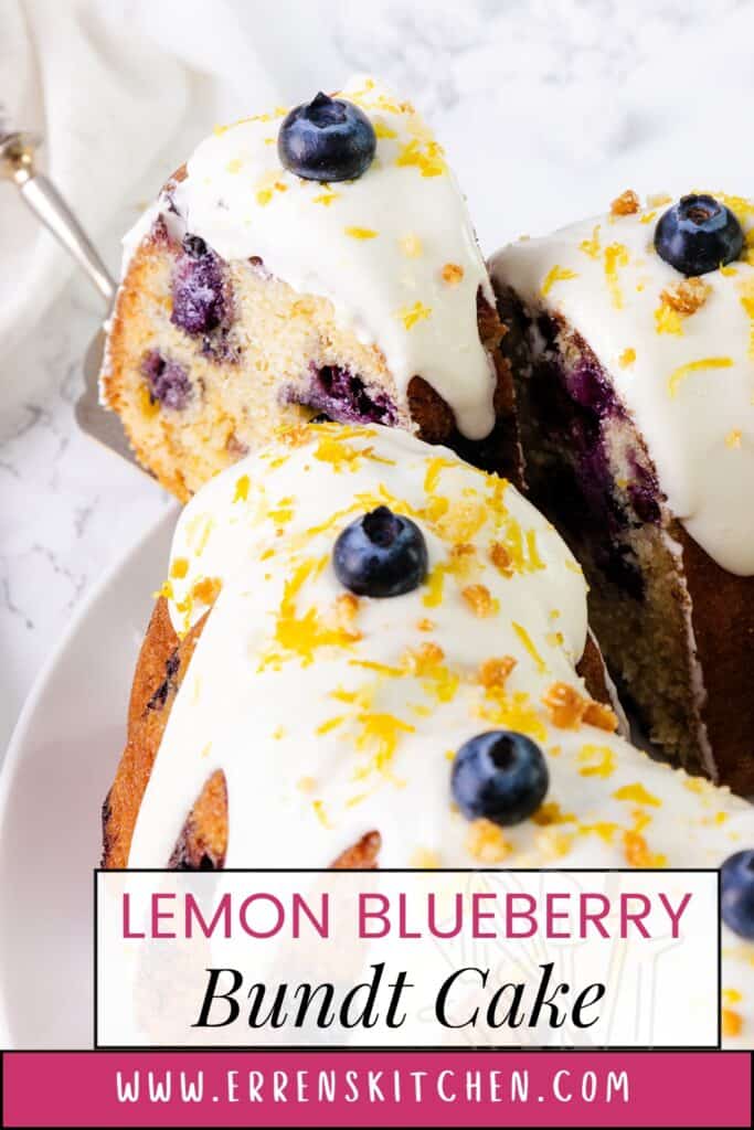 Close-up of a sliced Lemon Blueberry Bundt Cake from Erren's Kitchen, highlighting a moist yellow cake with blueberries throughout. The slices are topped with a white glaze, fresh blueberries, and lemon zest, presented on a white plate. Text overlay reads 'Lemon Blueberry Bundt Cake' and 'www.errenskitchen.com.'