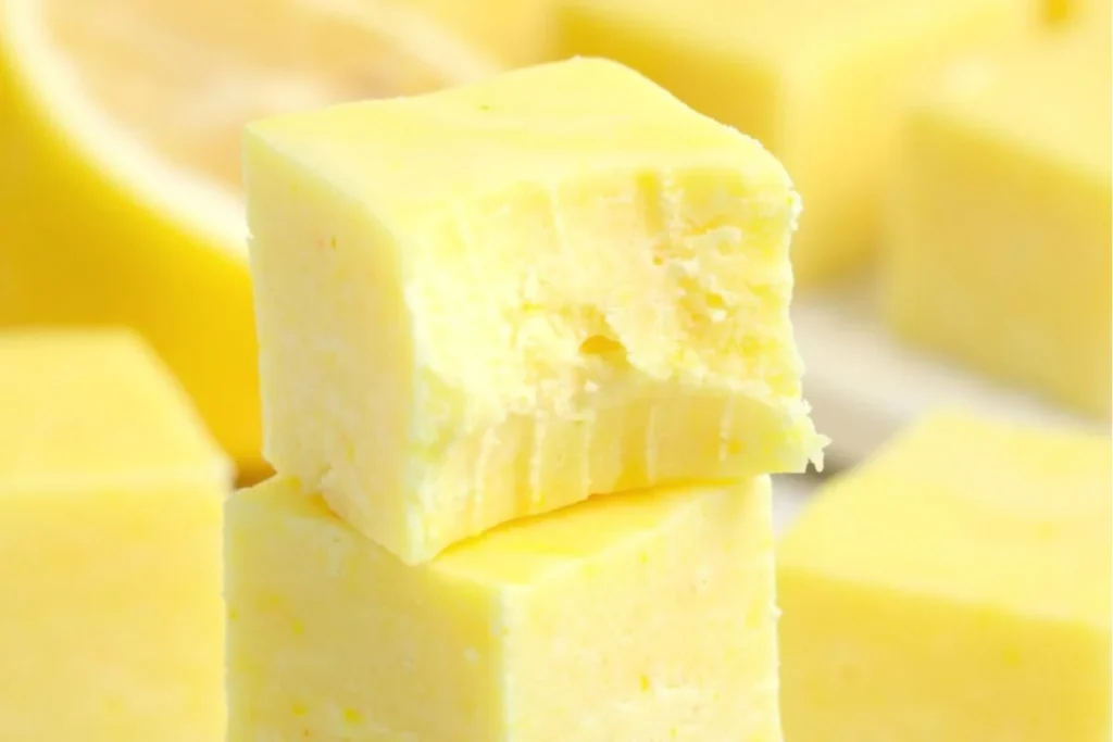 A close up image of a square of Lemon Fudge .