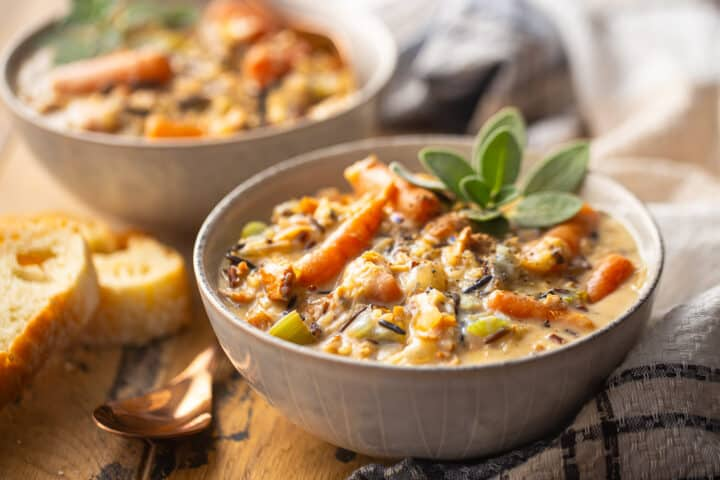 A close up image of Chicken and Wild Rice  with carrots Soup.