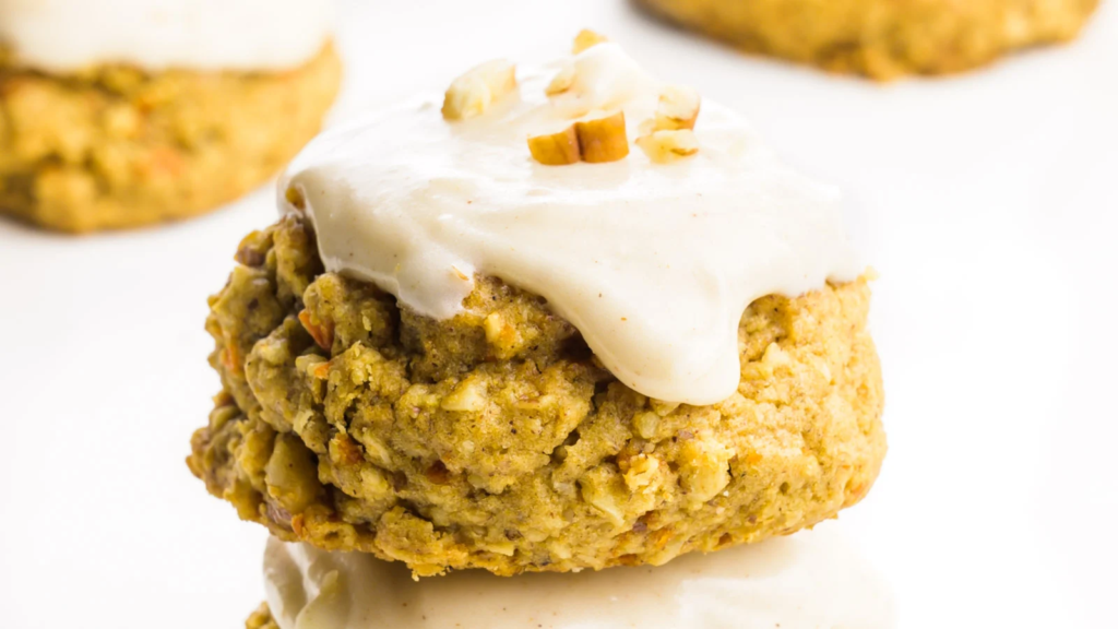 A close up image of an iced Carrot Cake Cookie