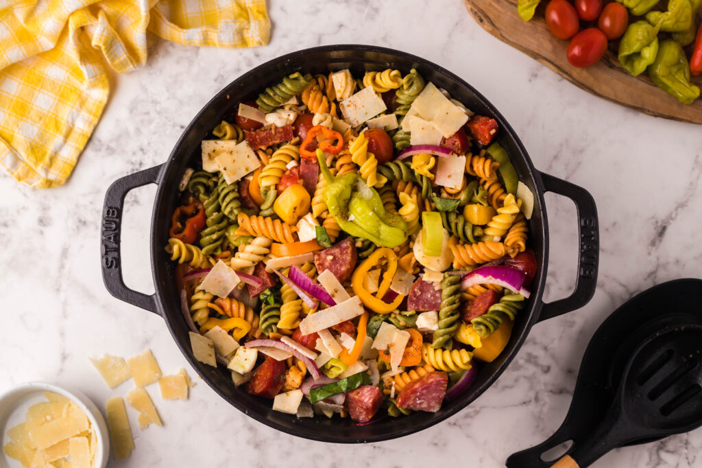 A black bowl with handles full of Smoked Italian Pasta Salad. 