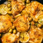 A skillet filled with golden-brown chicken thighs, green olives, and lemon slices in a savory sauce makes for one of the most popular recipes. The dish is a delight, garnished with herbs and cooked to a crispy texture.