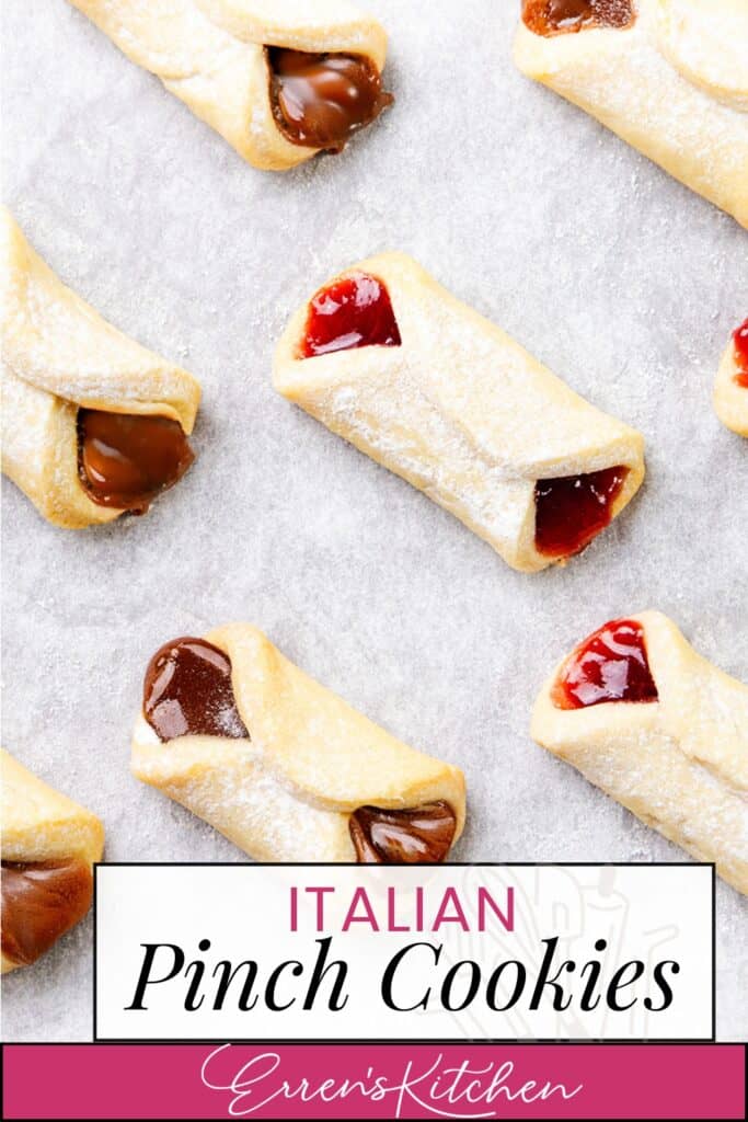 From above, a delightful array of Italian pinch cookies sits on a light backdrop. Filled with rich chocolate and vibrant red jam, some are delicately dusted with powdered sugar. The image features the text: "Italian Pinch Cookies - Erren's Kitchen.