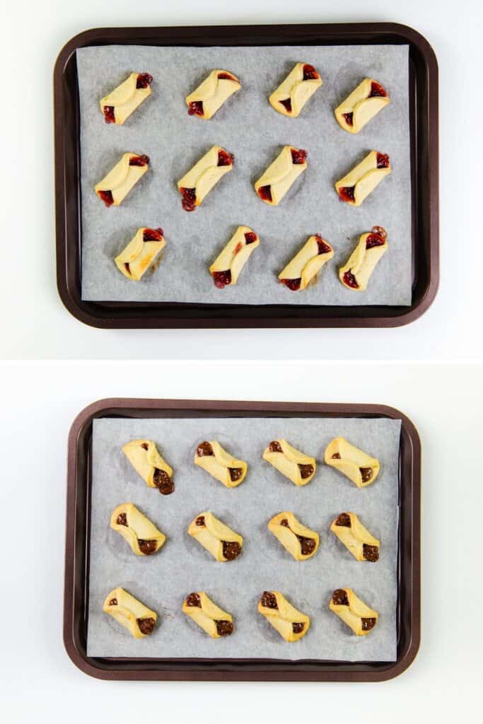 Two baking trays on parchment paper: the top tray showcases unbaked Italian Pinch Cookies with visible red filling, while the bottom tray displays the same cookies after baking, golden brown with the filling slightly oozed out.